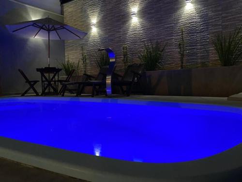 Prado House | Casa com piscina e um quarto com ar split pé na areia a 50 metros da praia
