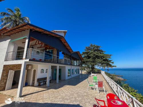 Praia de Borrifos House | Casa costeira com vista e área gourmet no Borrifos