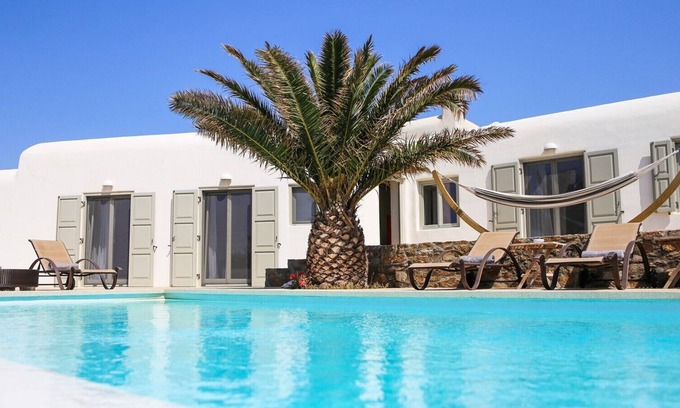Agios Stefanos Villa | Casa Di Mare, elegant, luxury, villa with unforgettable sunset view by Elite Estates.