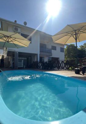 Piratuba House | Casa dos Gerânios com Piscina - 4 Quartos climatizados, espaçosa ideal para encontro de grupos e familiares, próximo do Parque Termal!