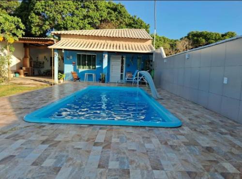 Tamoios House | Casa em Unamar com piscina privativa
