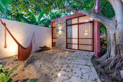 Centro House | Casa Tuch. Suites independientes de diseño. Retiro de lujo, oasis de paz.