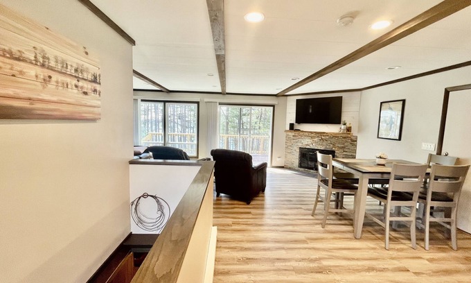 Lake Shore Estates House | Castle Rock Lakefront Home, with pier, sand bottom, and wrap around deck