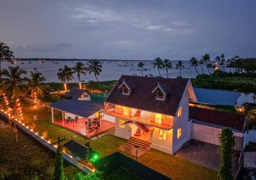 Kumbalam House | Celestiah Lakeshore by VOYE HOMES