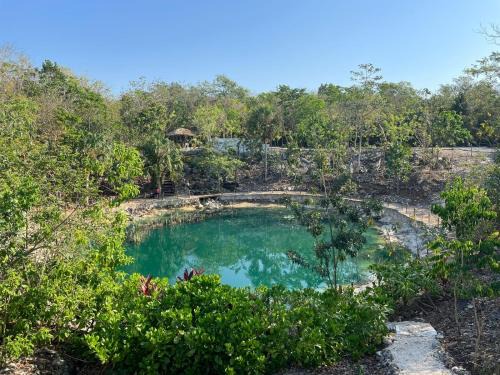Lazaro Cardenas Resort | Cenote Escondido Villas y Camping