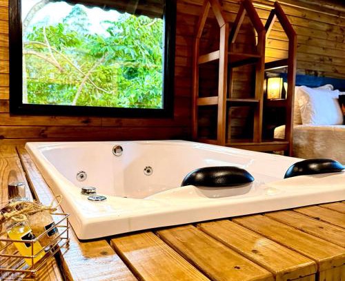 Praia Grande Ski Chalet | Chalé Girassol 4