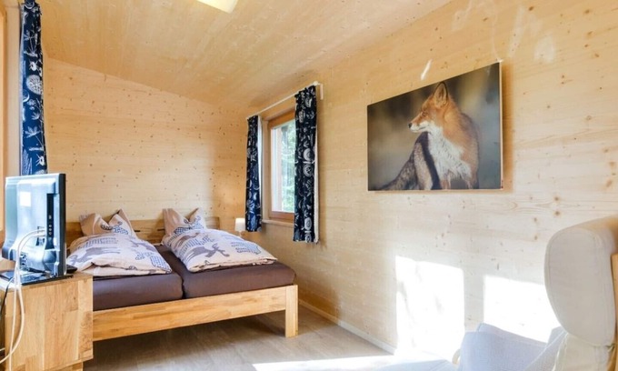 San Genesio Atesino Ski Chalet | Chalet on the edge of the forest with a large glass front