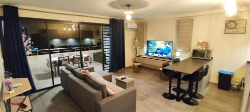 Papeete Apartment | Charmant F2 à SkyNui, piscine de 25m et vue mer