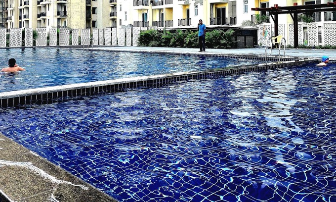 Noida Apartment | Charming 2-bedroom apartment with Pool View