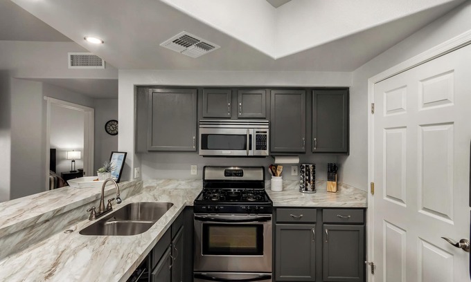 Kaufman And Broad At The Vineyards Apartment | Charming 2-bedroom condo with Heated Pool & fitness room, 1 King 1 Queen