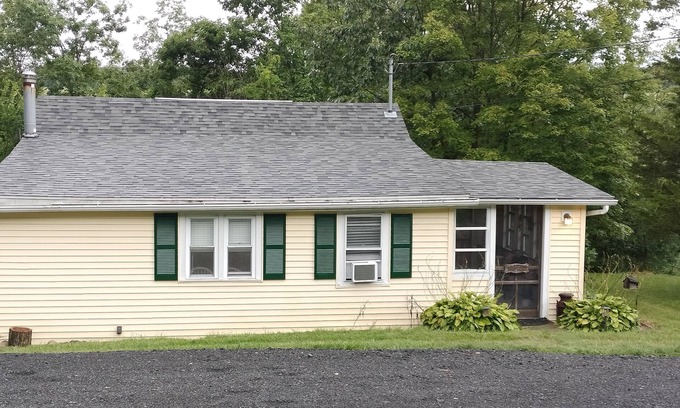 Fishertown Cottage | Charming 2-bedroom cottage near Bedford, screened porch deck & private setting