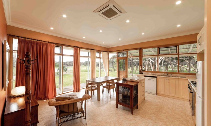 Macgillivray Cottage | Charming and Private Cottage with Fireplace for a Cozy Island Getaway.