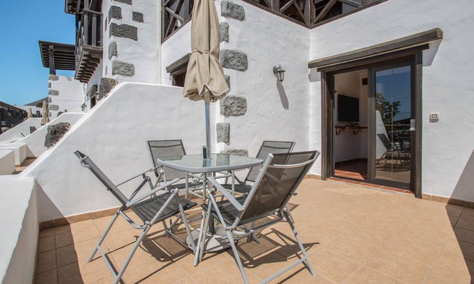 La Asomada Apartment | Charming Apartment "2" with Terrace, Community Pool & Wi-Fi