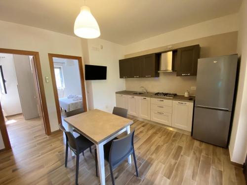 Chiesiola Apartment | Charming Apartment in Vieste with Shared Pool and Garden