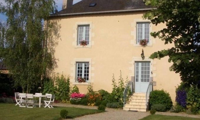 Cosse-le-Vivien Cottage | Charming Lakeside Manor with Garden, Ping-Pong, Biking, and Fishing