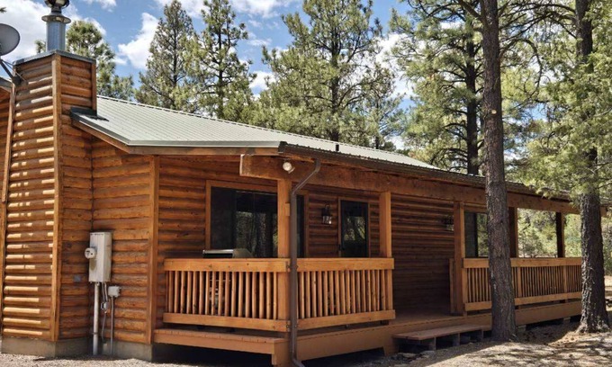 Eagar Cabin | Charming remodeled family cabin room for 8 nestled in the woods & near lakes