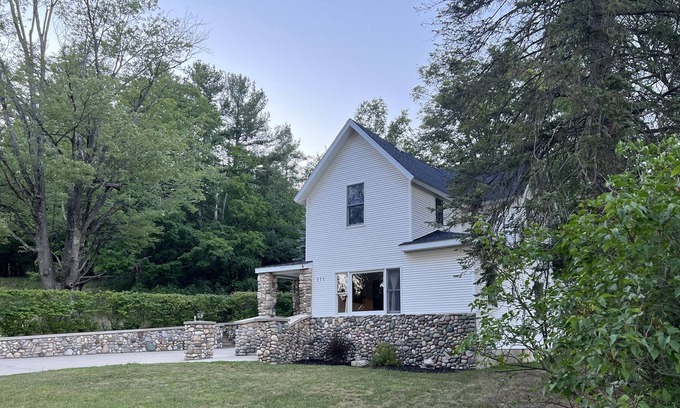 Bellaire Cottage | Charming Stone Cottage in Downtown Bellaire