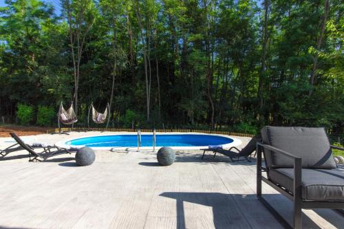 Zupanici Villa | Charming villa Prisca with pool and nice view of the wood