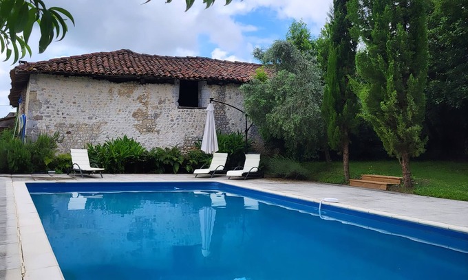 Nonac House | Chez Foucherie - Renovated farmhouse with pool, gardens & games room