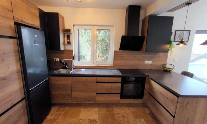 Kunje Apartment | Chic 3-bedroom apartment with WiFi, AC in cool Kunje