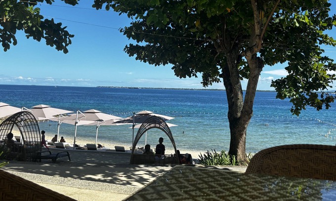 Lapu-Lapu Condo | Clean and cozy ocean view 1BR condo, Mactan, WiFi, pool, private beach