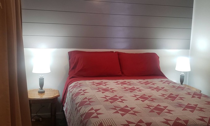 Eagle River Cottage | Clean cottage on the Eagle River Chain, dock, firewood, edge of town