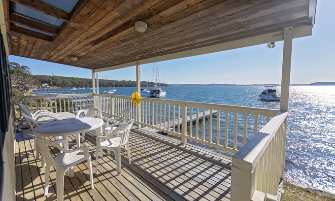 Sunshine Cottage | CLEARVIEW: A feel-good, sunny, north-facing waterfront lake house with jetty