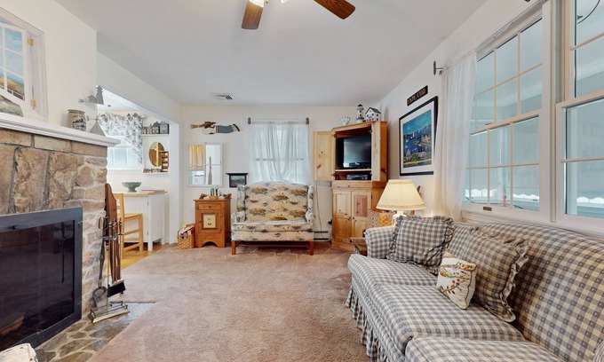 Pocasset House | Coastal dog-friendly cottage near Hen Cove with sunroom, beach access, & games
