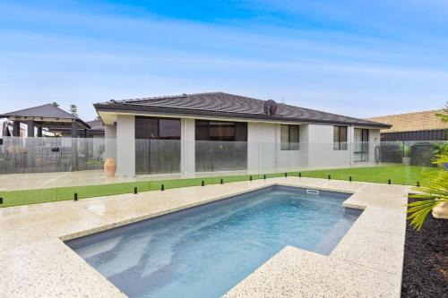 Secret Harbour House | Coastal Retreat with Pool Alfresco & Family Comfo