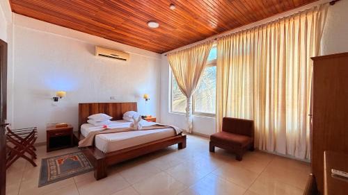 Elmina Hotel | Coconut Grove Beach Resort