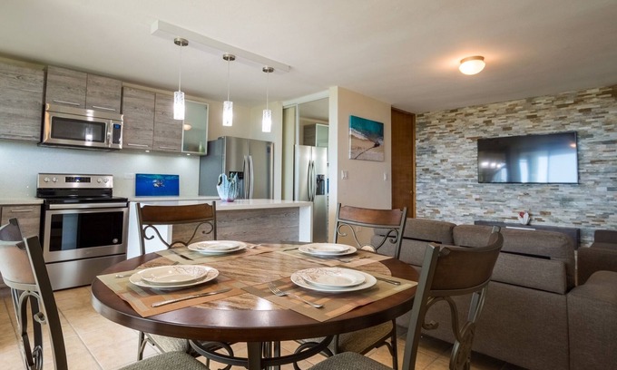 El Combate Condo | COMBATE BEACH! SERENITY! PENTHOUSE WITH ROOF TERRACE! NEAR ALL BEACHES!