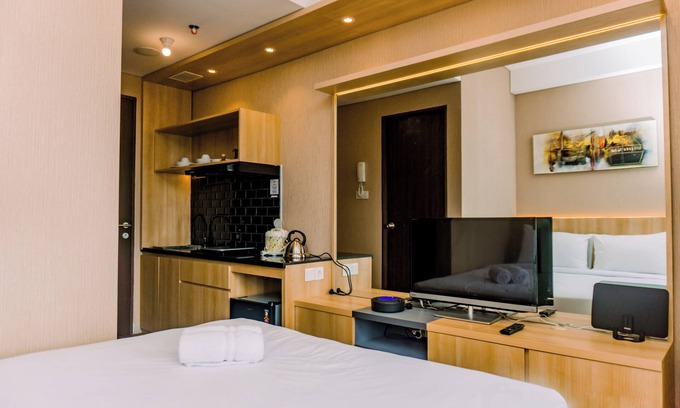 Ciputat Apartment | Comfort And High Floor Studio Room At Transpark Bintaro Apartment