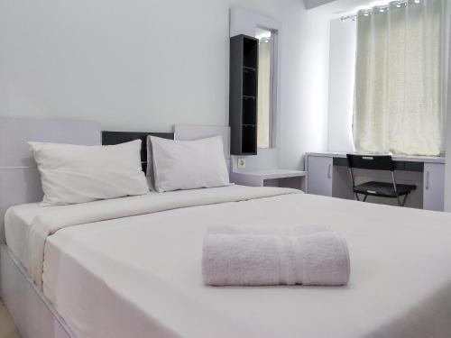 Karawang Apartment | Compact and Cozy Tamansari Mahogany Studio Apartment By Travelio