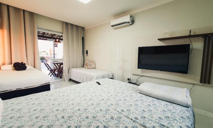 Arembepe Apartment | Confortável casa em Arembepe,100 metros da Praia com Churrasqueira Piscina e Wi-fi
