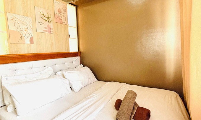 Iloilo Condo | Convenient City Hub with Relaxing Interior