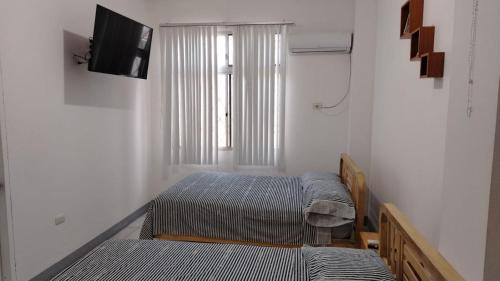 Playas House | Coral, habitación de Flor de Lis Beach House