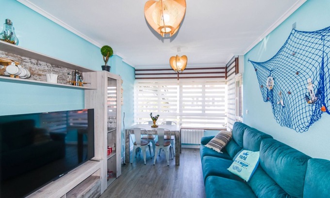 Suances Apartment | Cosy and comfortable flat with swimming pool and paddle tennis court.