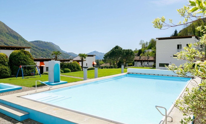 Capriasca Apartment | Cosy apartment for 6 guests with WIFI, pool, TV, patio and panoramic view