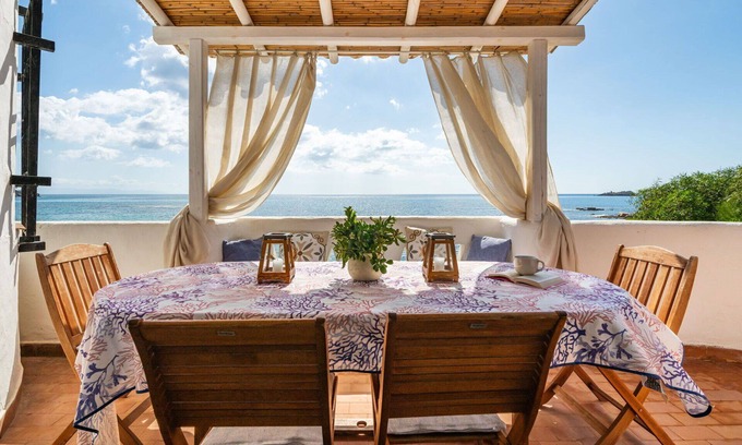 Province of Cagliari Villa | Cosy apartment in villa for 8 guests with A/C, WIFI, TV and patio