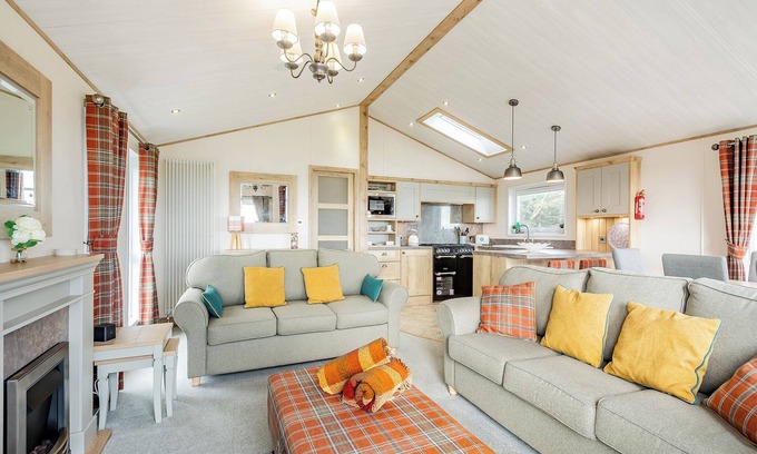 Kirkcudbright Ski Chalet | Country and modern cladded lodge with sea views.