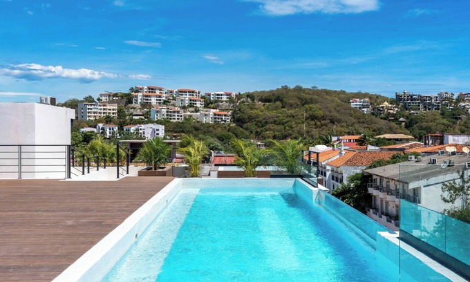 Santa Maria Huatulco Condo | Cozy 1-bedroom condo with 4 rooftop pools, BBQ area only a minute to the beach!