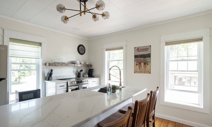 Manistee Apartment | Cozy 1+ Bedroom Haven with Charm and is a block from downtown!