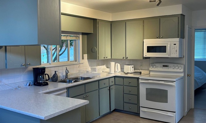 District of North Vancouver House | Cozy 4 bedroom home near Grand Blvd Park