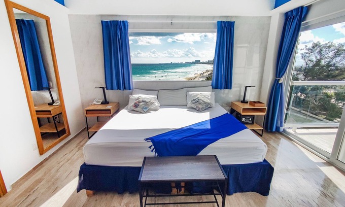 Punta Cancun Condo | Cozy Condo Beachfront Bedroom w/Beach View & Unbeatable Location
