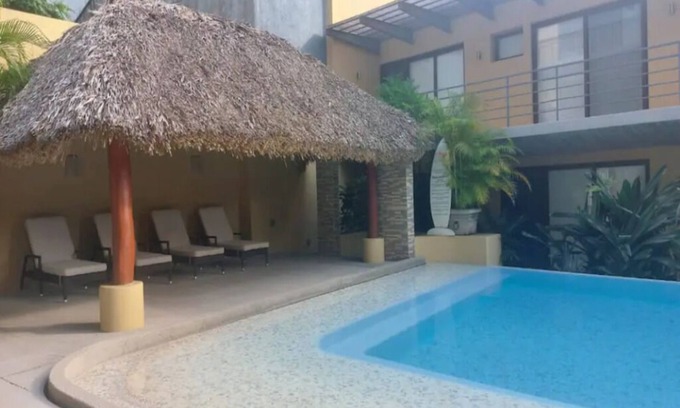El Hujal Condo | Cozy condo with pool and palm shelter- 5 min from the beach!