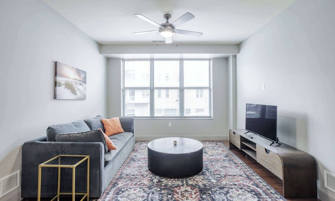 Central Business District Apartment | CozySuites at the Banks gym, pool 16