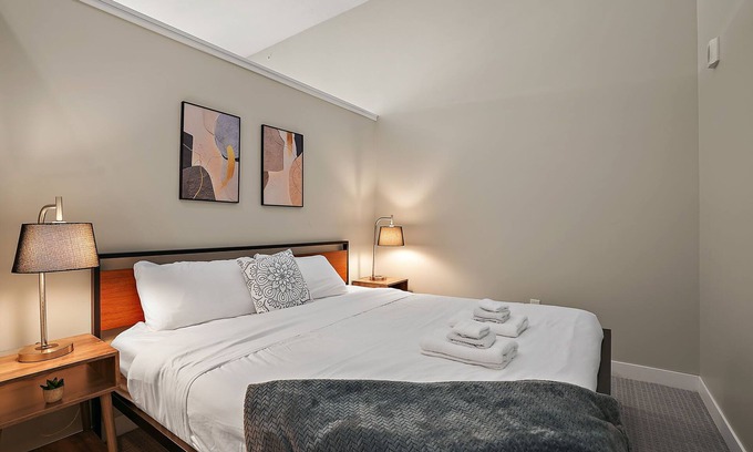 Downtown Minneapolis Apartment | CozySuites Marquee | pool, gym #05