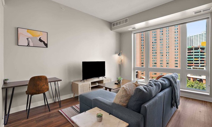 Downtown Minneapolis Apartment | CozySuites Marquee | pool, gym #06