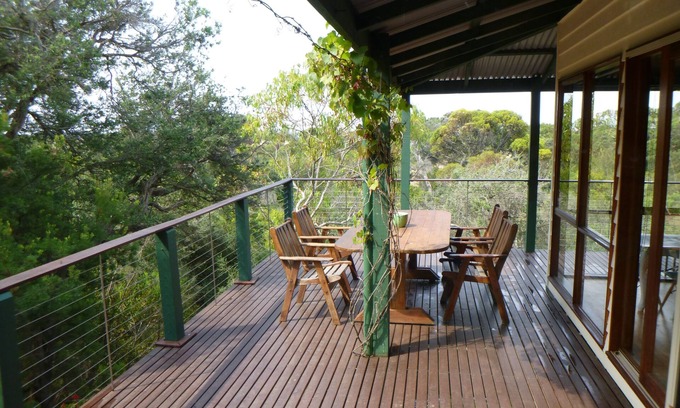 St. Andrews Beach House | Decks with views, fireplace and playground. all only a short walk to beach.