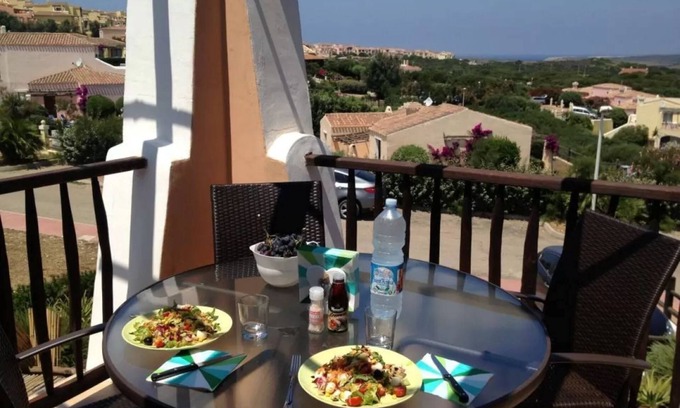 Stintino Apartment | Delightful sea view apartment with veranda